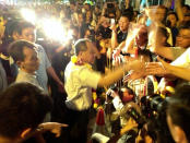 WP chief Low Thia Khiang greets supporters after the party's last rally in Punggol East. (Yahoo! photo)