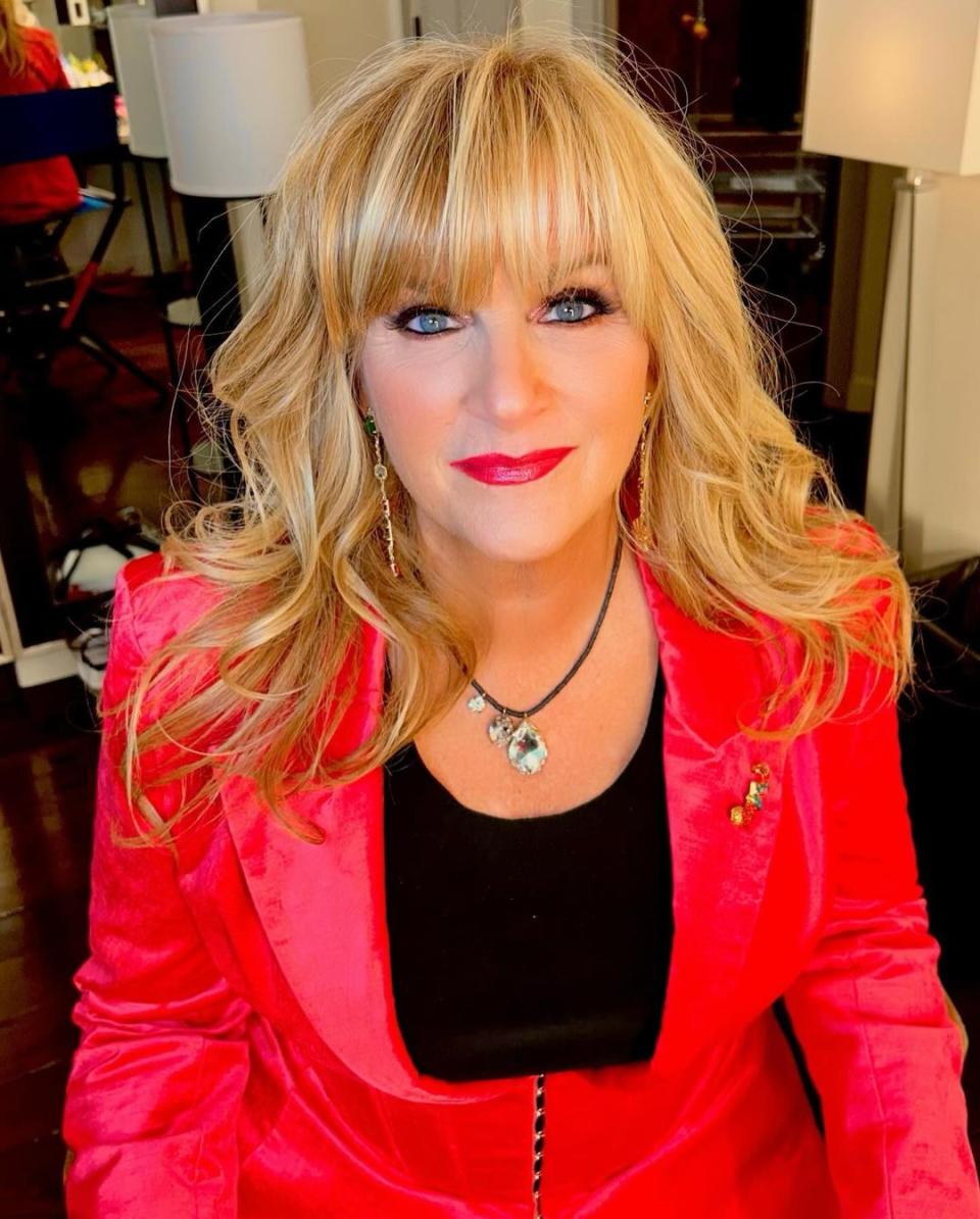 Trisha Yearwood Looks Unrecognizable With Bangs and Bold Red Lip in New