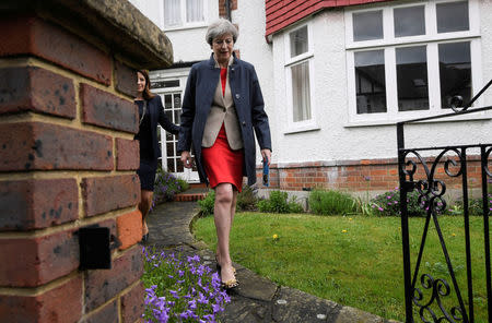 Prime Minister Theresa May goes canvassing with local Conservative candidate Joy Morrissey in Ealing, London, Britain May 20, 2017. REUTERS/Toby Melville/File photo