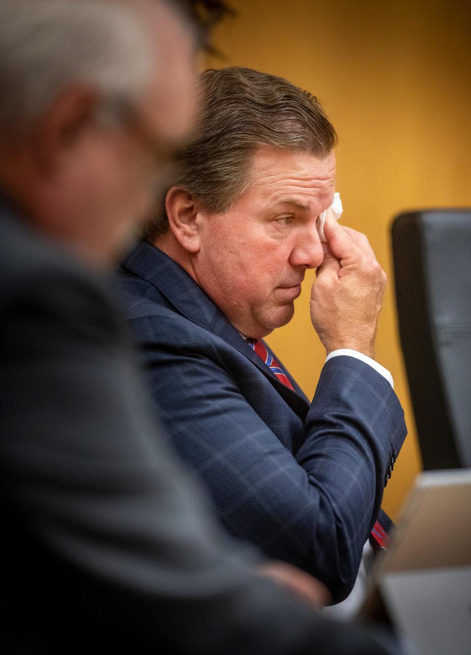 Former Lakeland City Commissioner Michael Dunn dabs a tear as he listens to testimony during a sentencing hearing in court in Bartow on Monday . Dunn shot and killed Cristobal Lopez as Lopez tried to steal a hatchet from a military surplus store that Dunn managed in Lakeland. Dunn pleaded guilty in March to manslaughter with a firearm, just days before his trial was set to start.