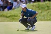 Jul 23, 2017; Southport, ENG; Jordan Spieth lines up a putt on the first green during the final round of The 146th Open Championship golf tournament at Royal Birkdale Golf Club. Mandatory Credit: Ian Rutherford-USA TODAY Sports