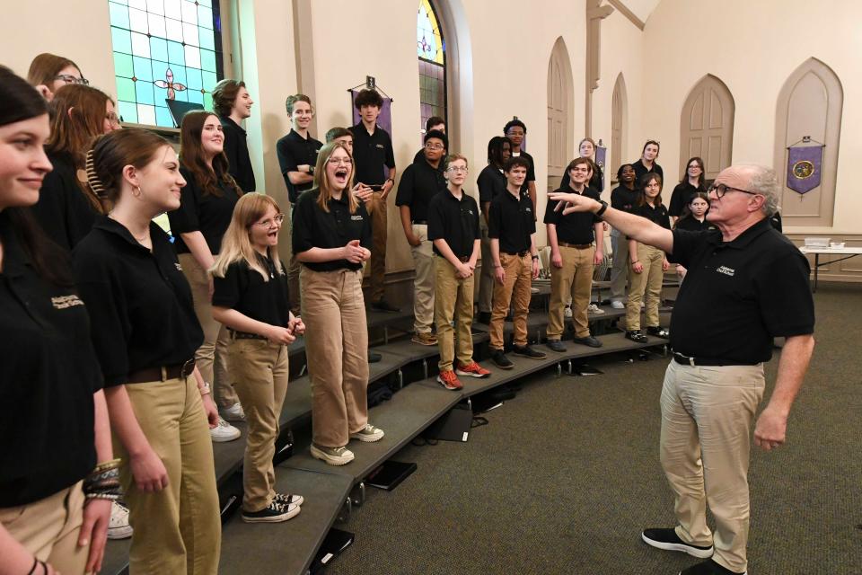 April 17, 2024; Tuscaloosa, AL, USA; Doff Procter and his wife Laurel are retiring from directing the Alabama Choir School. Members of the choir laugh as Doff Procter makes a joke during a rehearsal at Christ Episcopal Church.