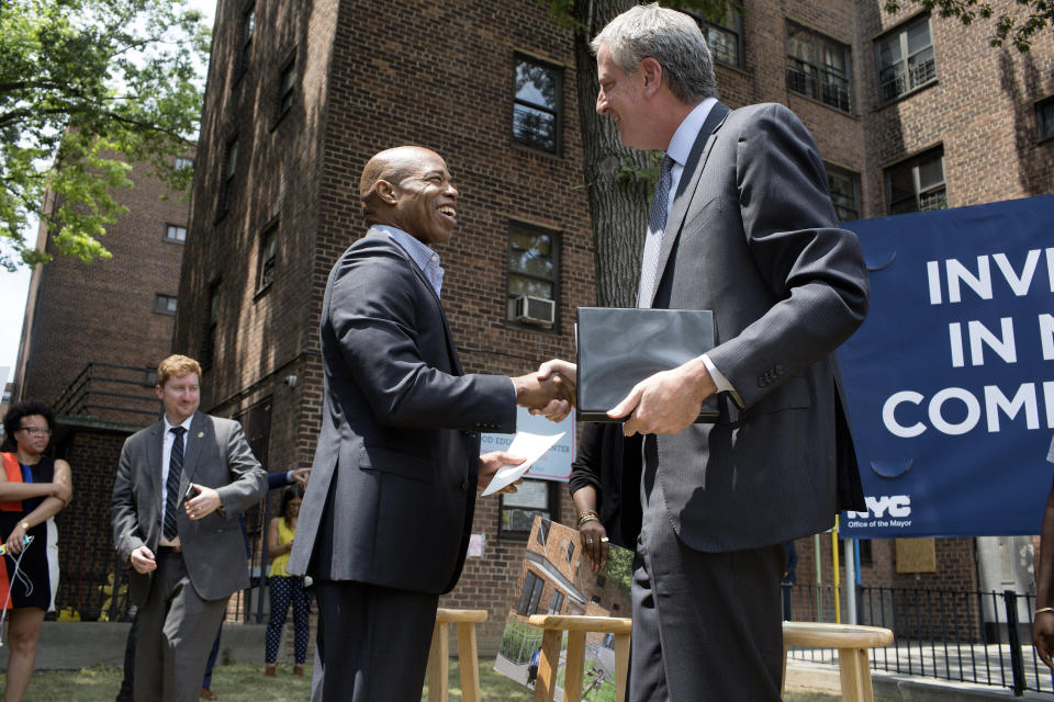 Some progressives see Adams' ties to Mayor Bill de Blasio, right, as a selling point. Others see it as a sign that he would have more of de Blasio's flaws than Yang would. (Photo: Andrew Lichtenstein/Getty Images)