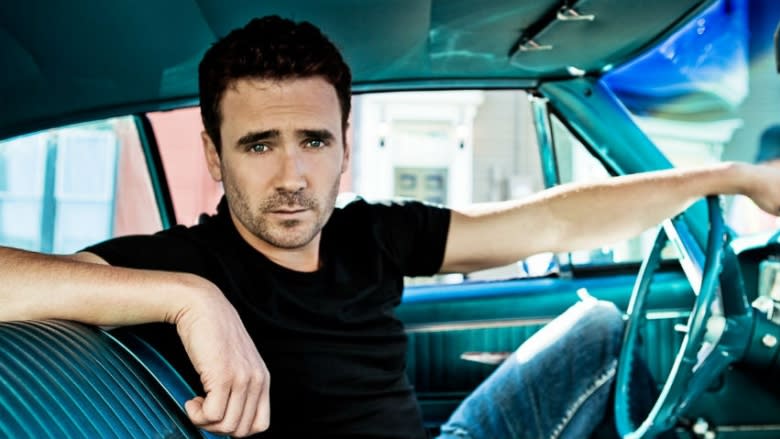 Gone with the wind, townie style: Allan Hawco's car halts woman's slide across busy street