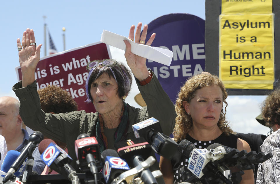 Rep. Rosa DeLauro, D-Conn., left, and Rep. Debbie Wasserman Schultz, D-Fla., right, hold a news conference following a tour of the Homestead Temporary Shelter for Unaccompanied Children, Monday, July 15, 2019, in Homestead, Fla. (AP Photo/Lynne Sladky)