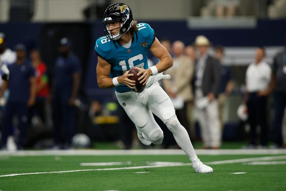 Many in the Jacksonville Jaguars' organization are glad to see quarterback Trevor Lawrence (16), seen here rolling out to pass in last week's preseason win over the Dallas Cowboys, take a more authoritative role and ownership of the offense.