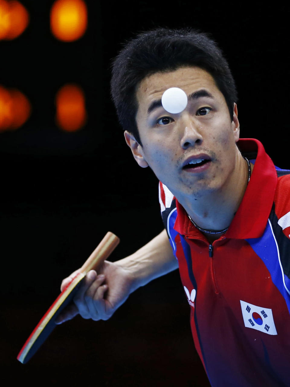 South Korea's Joo Saehyuk serves to Hong Kong's Jiang Tianyi in their men's team semifinals table tennis match at the ExCel venue during the London 2012 Olympic Games August 6, 2012. REUTERS/Darren Staples (BRITAIN - Tags: OLYMPICS SPORT TABLE TENNIS) 