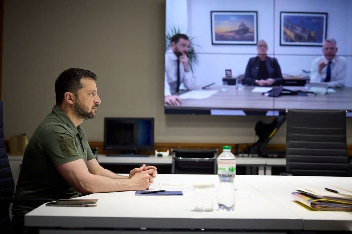 Ukraine’s President Volodymyr Zelensky speaks with bosses of BAE Systems via video link on Tuesday  (via REUTERS)