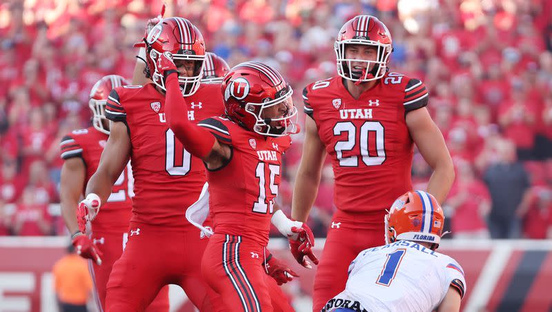 Utah defensive back Tao Johnson (15) makes a tackle for a loss against Florida in Salt Lake City on Thursday, Aug. 31, 2023 during the season opener.