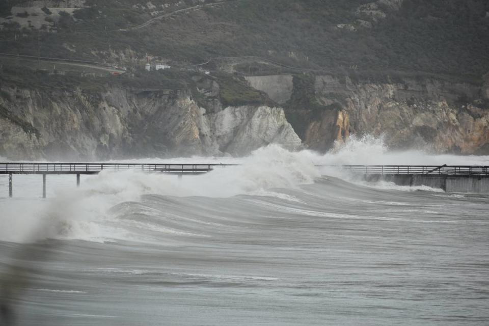 Large waves hammer the Avila Beach Pier on Thursday, Dec. 29, 2023.