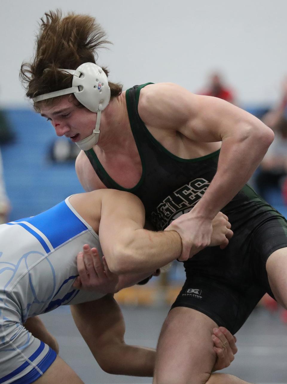 GlenOak's Brandon Batson, facing, is taken down by Brunswick's Derek Fields during their 160 pound quarterfinal match in the Division I OHSAA State Wrestling Tournament at Hilliard Darby High School, Saturday, March 13, 2021, in Hilliard, Ohio. [Jeff Lange/Beacon Journal]