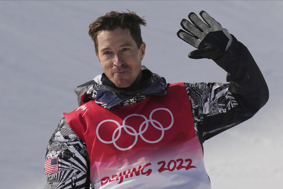 FILE - Shaun White waves after competing in the men's halfpipe finals at the Winter Olympics, Feb. 11, 2022, in Zhangjiakou, China. White is starting a season-long halfpipe league that will offer $1.5 million in prizes in hopes of pulling together what has long been a spread-out, confusing action-sports calendar. (AP Photo/Francisco Seco, File)