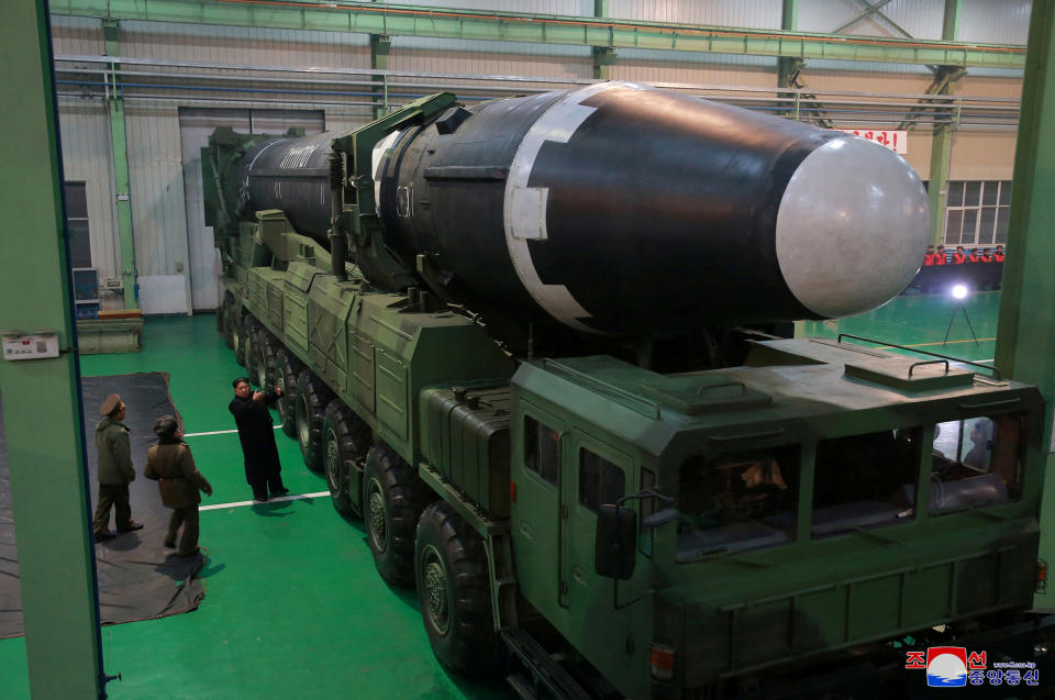 North Korea's leader Kim Jong Un is seen as the newly developed intercontinental ballistic rocket Hwasong-15's test was successfully launched, in this undated photo released by North Korea's Korean Central News Agency (KCNA) in Pyongyang November 30, 2017. REUTERS/KCNA ATTENTION EDITORS - THIS IMAGE WAS PROVIDED BY A THIRD PARTY. REUTERS IS UNABLE TO INDEPENDENTLY VERIFY THIS IMAGE. SOUTH KOREA OUT. NO THIRD PARTY SALES. NOT FOR USE BY REUTERS THIRD PARTY DISTRIBUTORS     TPX IMAGES OF THE DAY