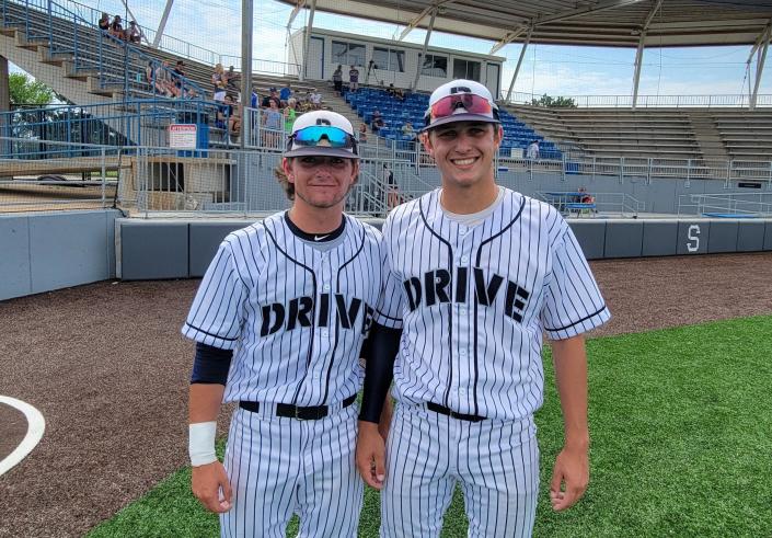 Cameron Yohe, left, made the defensive play of the game while Evan Bogart pitched a shutout and belted a home run in the Drive's 2-0 Kansas Grand Slam 16-under championship victory over the Topeka Stogies on Sunday at Dean Evans Stadium.