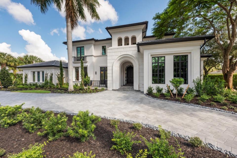 After photo of an estate home in Quail West Golf & Country Club in Naples.