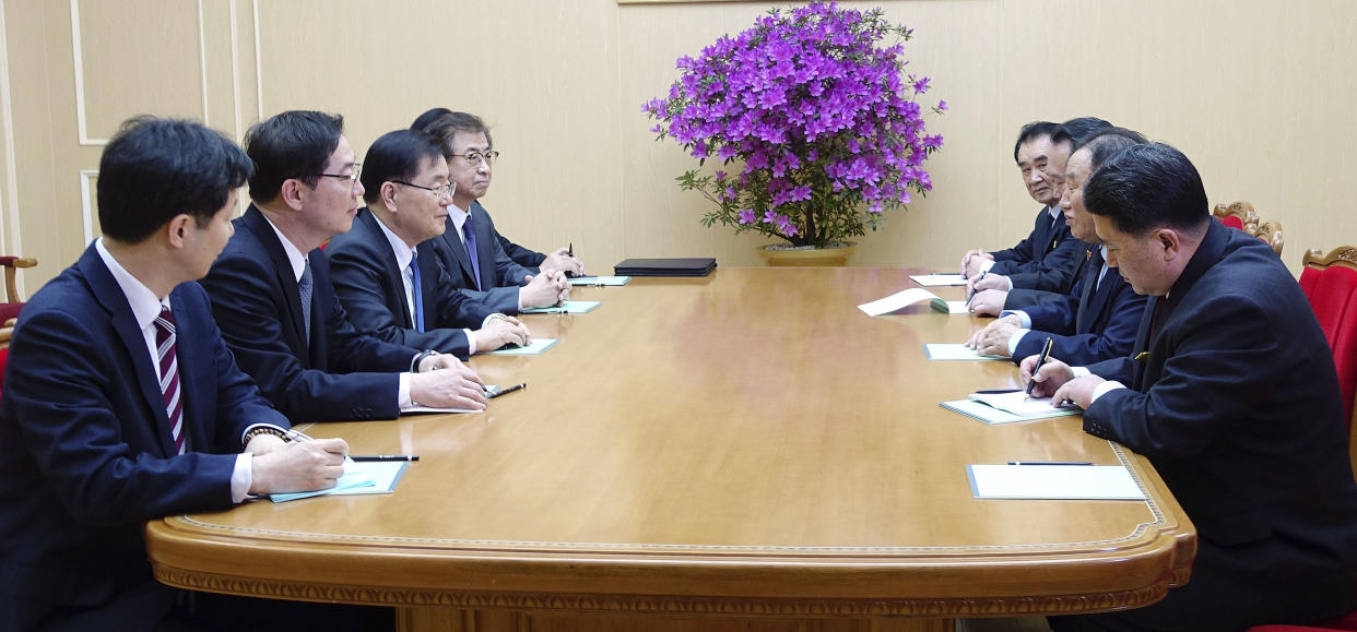 South Korean and North Korean delegations sat down today (Picture: PA)