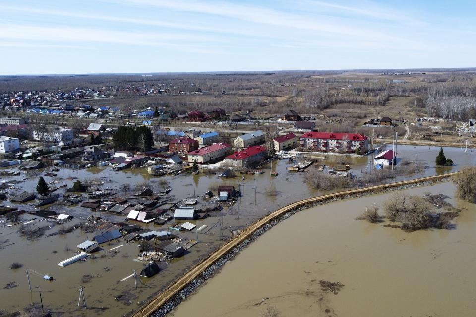 An aerial view of a flooded area in Ishim, Tyumen region, 1968 km (1230 miles) east of Moscow, Russia, on Monday, April 22, 2024. The situation with floods in Russia's Tyumen Region remains tense, with the level of water in the Ishim River having exceeded 10.5 meters. (AP Photo/Sergei Rusanov)