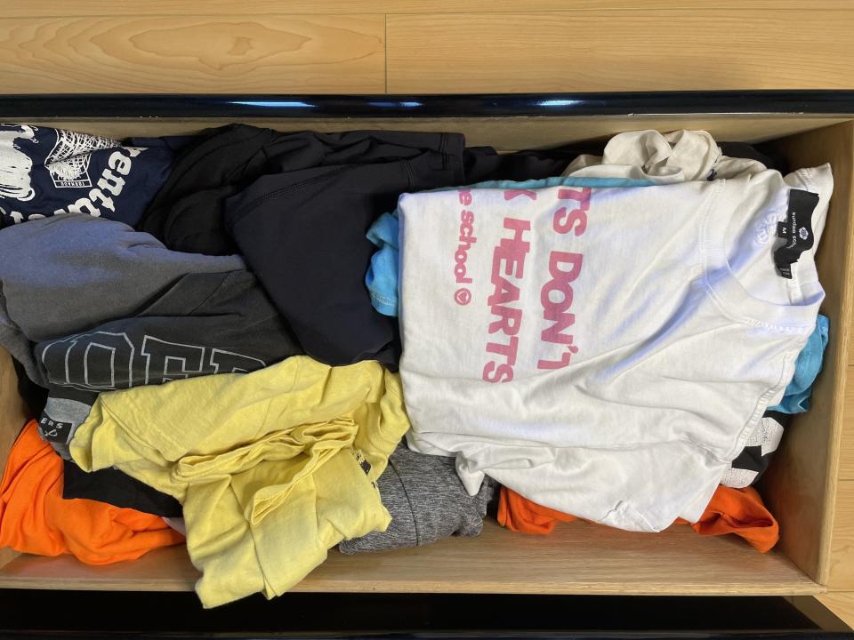 Another T-shirt drawer full of unfolded or partially folded shirts