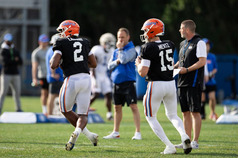 Florida Gators quarterback DJ Lagway (2) and Florida Gators quarterback Graham Mertz (15) looks to throw during spring football practice at Heavener Football Complex at the University of Florida in Gainesville, FL on Tuesday, April 2, 2024. [Matt Pendleton/Gainesville Sun]