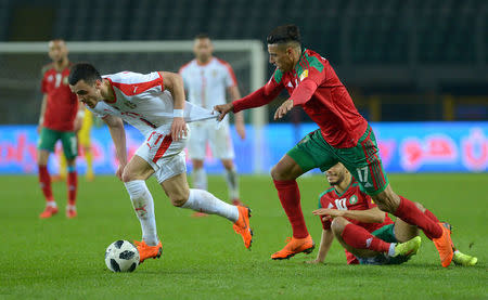 Soccer Football - International Friendly - Serbia vs Morocco - Stadio Olimpico Grande Torino, Turin, Italy - March 23, 2018 Serbia's Filip Kostic in action with Morocco's Nabil Dirar REUTERS/Massimo Pinca