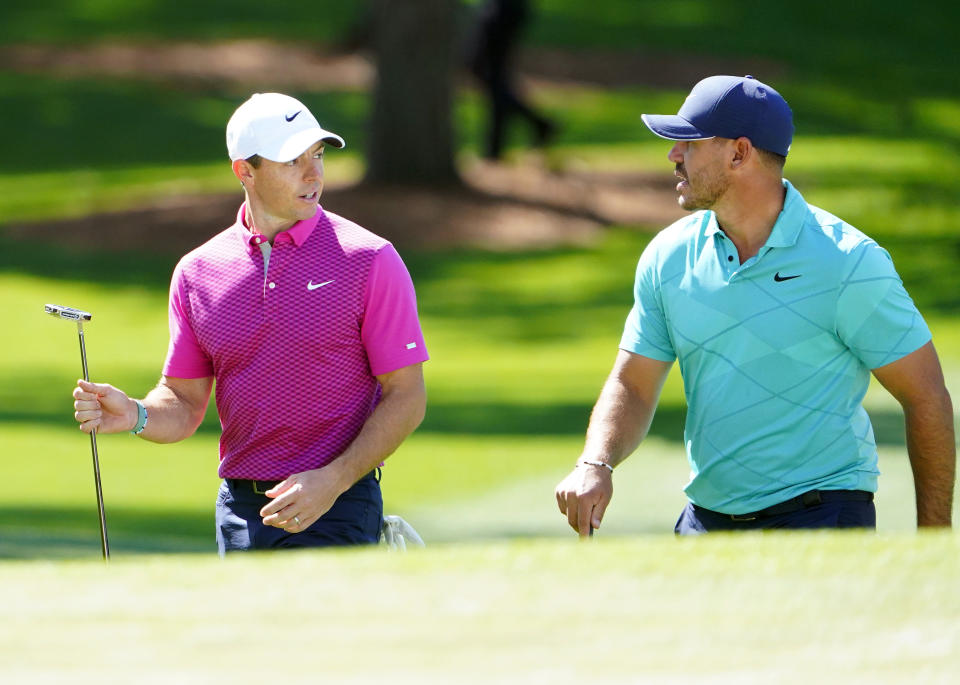 Rory McIlroy and Brooks Koepka walk to the no. 7 green during the first round of The Masters golf tournament at Augusta National Golf Club. (Danielle Parhizkaran-Augusta Chronicle/USA TODAY Sports)