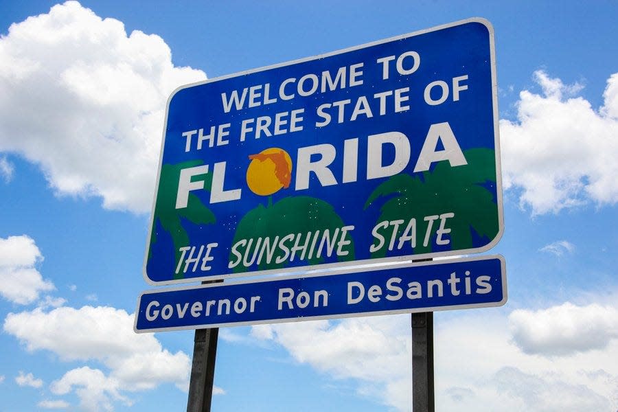 New signs at the Florida border, ordered by Gov. Ron DeSantis, welcome travelers to the "Free State of Florida."