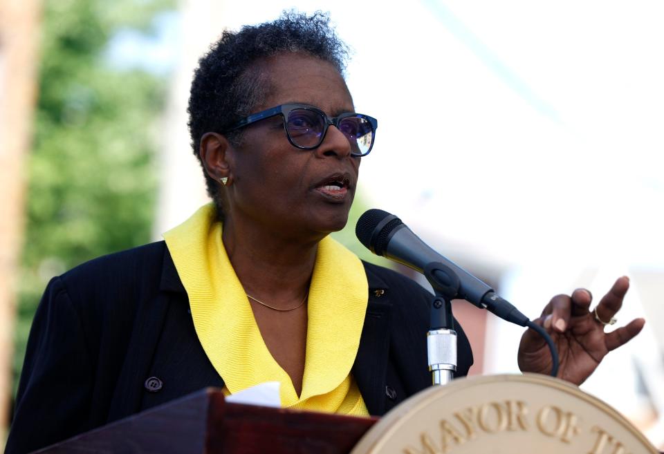 Sandra Henriquez, the chief executive officer for the Detroit Housing Commission, talks during a press conference in front of an abandoned apartment complex behind heron Tyler street in Detroit on Thurs., July 21, 2022. City officials announced a $203 million strategy for expediting and creating more deeply affordable housing in neighborhoods across the city of Detroit. The plan includes turning vacant homes and apartment buildings into deeply affordable housing; turning more renters into homeowners; and fast-tracking projects that include apartments below 60 percent area median income, among other initiatives.