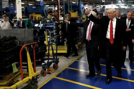 U.S. President-elect Donald Trump and Vice-President Elect Mike Pence tour a Carrier factory in Indianapolis, Indiana, U.S., December 1, 2016. REUTERS/Mike Segar