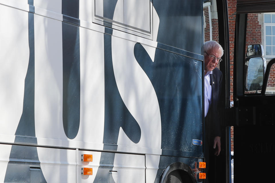 Democratic presidential candidate Sen. Bernie Sanders, I-Vt. , stepping off his bus as he arrives for a campaign event at The Black Box Theater, Saturday, Feb. 1, 2020, in Indianola, Iowa. (AP Photo/Pablo Martinez Monsivais)