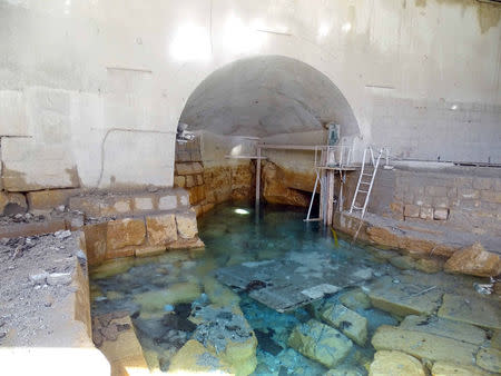 Damage is seen in the water pumping station in the village of Ain al-Fija in the Wadi Barada valley near Damascus, Syria in this handout picture provided by SANA on January 29, 2016. SANA/Handout via REUTERS