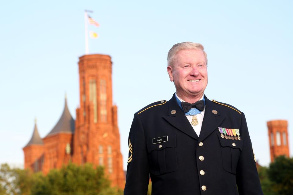 Retired Sgt. First Class Sammy L. Davis, a recipient of the Medal of Honor, attends a 25th anniversary screening of 