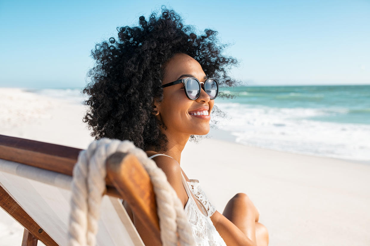 Woman with sunglasses enjoy vacation