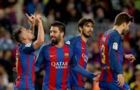 Football Soccer- Spanish La Liga Santander - Barcelona v Osasuna - Camp Nou stadium, Barcelona, Spain - 26/04/17 Barcelona's Paco Alcacer (L) celebrates a goal with team mates. REUTERS/Albert Gea