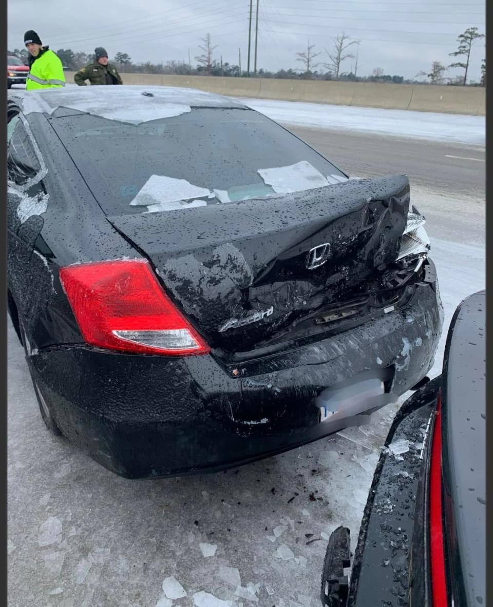 A Brunswick County sheriff's deputy's car was struck Saturday, Jan. 22, 2022, when a motorist slid and was was unable to stop on the Brunswick River Bridge going into Wilmington.