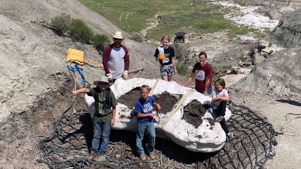 The dinosaur discovering family returns to the site in July 2023 for the dig, including (clockwise from top left) Sam Fisher, Emalynn Fisher, Danielle Fisher, Liam Fisher, Kaiden Madsen and Jessin Fisher.  - Courtesy of the Denver Museum of Nature and Science