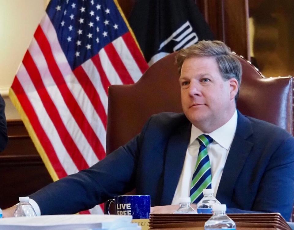 Gov. Chris Sununu, shown here at a May 4 Executive Council meeting, easily won reelection last week.