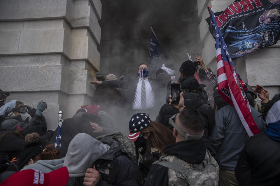 Demonstrators attempt to breach the U.S. Capitol after they earlier stormed the building in Washington D.C., on Jan. 6, 2021.<span class="copyright">Victor J. Blue—Bloomberg/Getty Images</span>