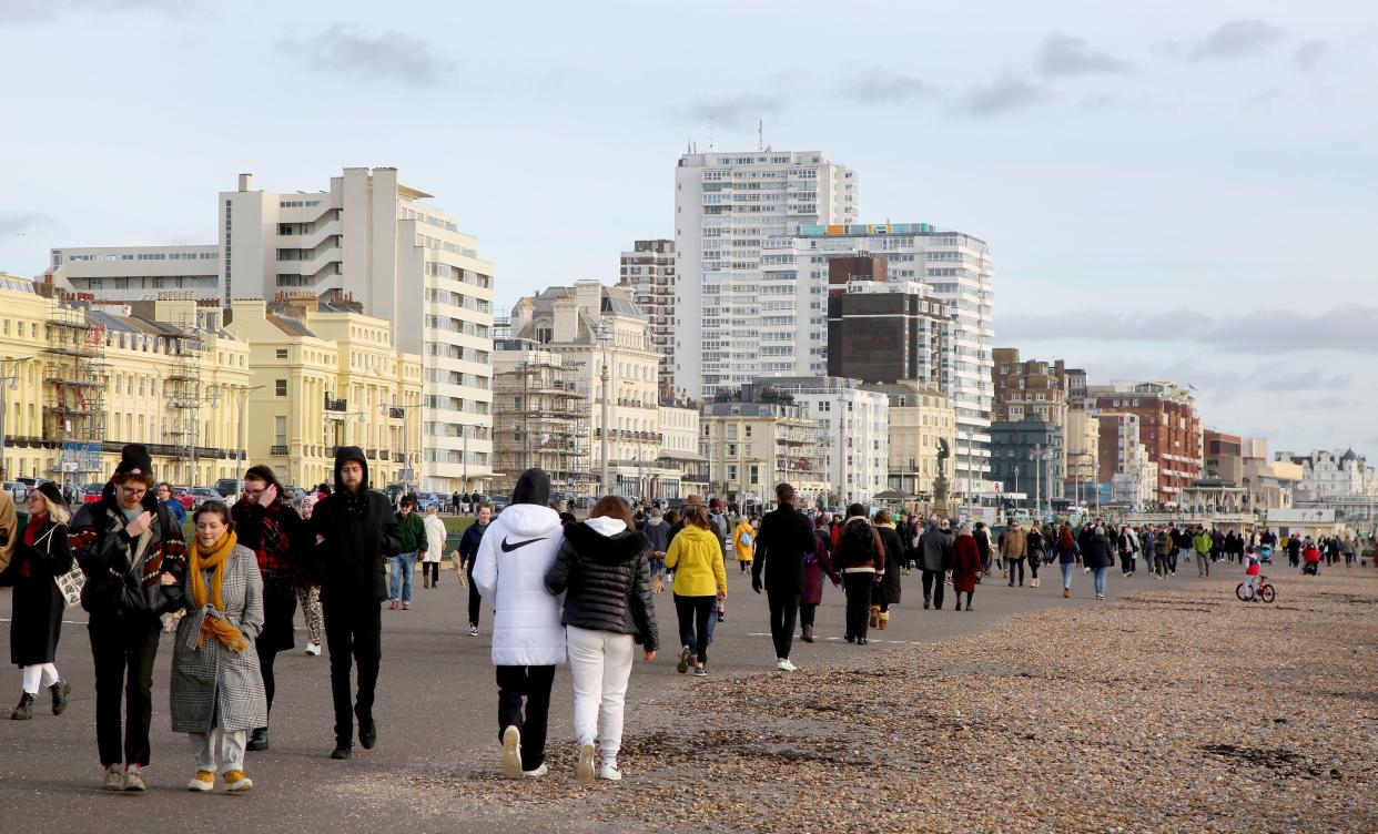 People on the sea front in Brighton during England’s third national lockdown (PA)