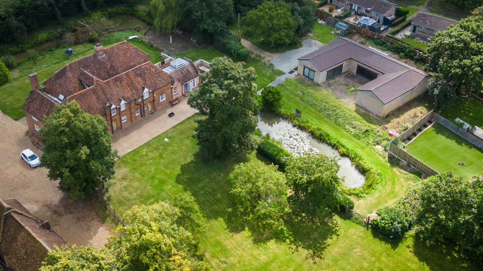 MARSTON MORETAINE, BEDFORDSHIRE - AUGUST 21: An aerial view of the home of Hannah Ingram-Moore, the daughter of Captain Tom Moore, on August 21, 2023 in Marston Moretaine, Bedfordshire. Ms Ingram-Moore and her husband are under scrutiny for conduct and financial activities relating to the Captain Tom Foundation charity, which Ms Ingram-Moore previously ran. One issue involves the construction of a home spa on their property that was initially described in planning documents as the 