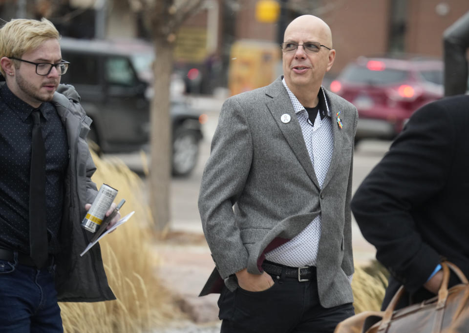 Michael Anderson, left, a survivor of the mass shooting at Club Q, walks with the club's co-owner, Matthew Haynes, into the El Paso County courthouse for a preliminary hearing for Anderson Lee Aldrich, the alleged shooter in the Club Q mass shooting Wednesday, Feb. 22, 2023, in Colorado Springs, Colo. (AP Photo/David Zalubowski)