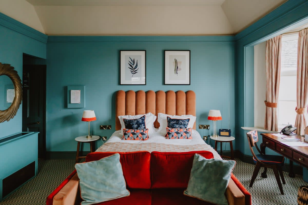Vivid colours and retro furnishings make for welcoming rooms (Ingleside House)