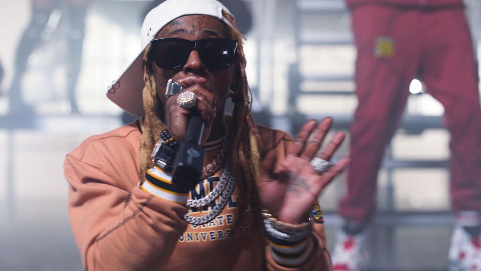 In this screengrab released on October 27, (L-R) Lil Wayne and 2 Chainz perform for the BET Hip Hop Awards 2020.