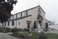 This Wednesday, Oct. 28, 2020, image shows the St. Francis of Assisi School in Braintree, Mass. Despite the Boston archdiocese’s access to cash and other readily available funds, it closed 11 schools last spring, including this one, often citing revenue losses due to the pandemic. (AP Photo/Rodrique Ngowi)