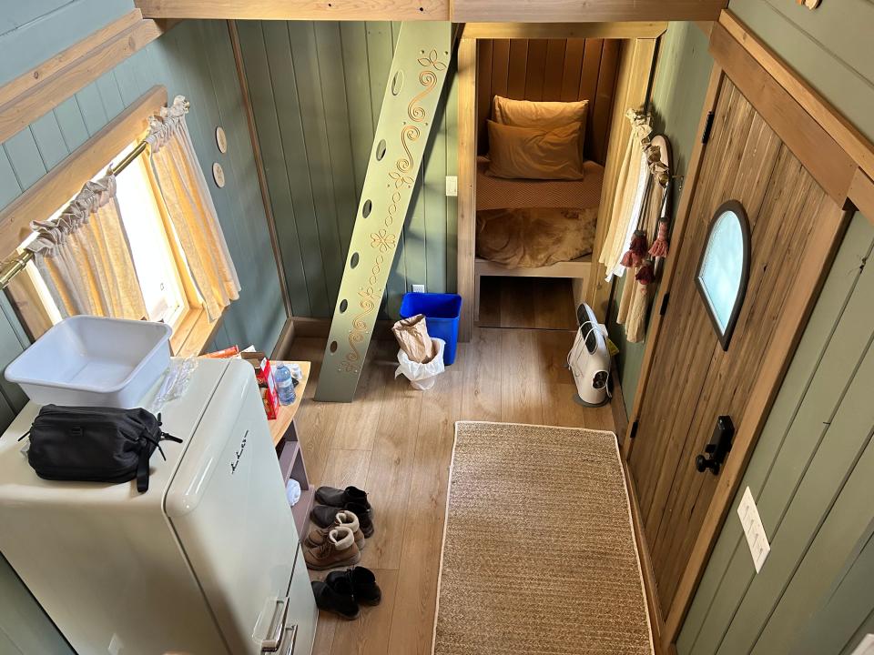 overview of rapunzel's cottage from above, fridge and door