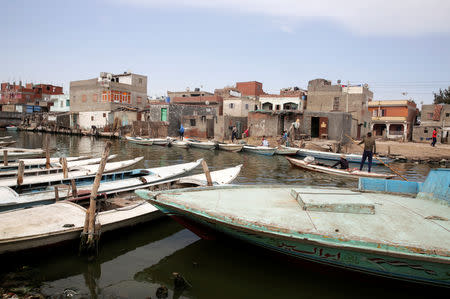 A general view of Egypt's Nile Delta village of El Shakhluba with boats and fishermen, in the province of Kafr el-Sheikh, Egypt May 5, 2019. Picture taken May 5, 2019. REUTERS/Hayam Adel