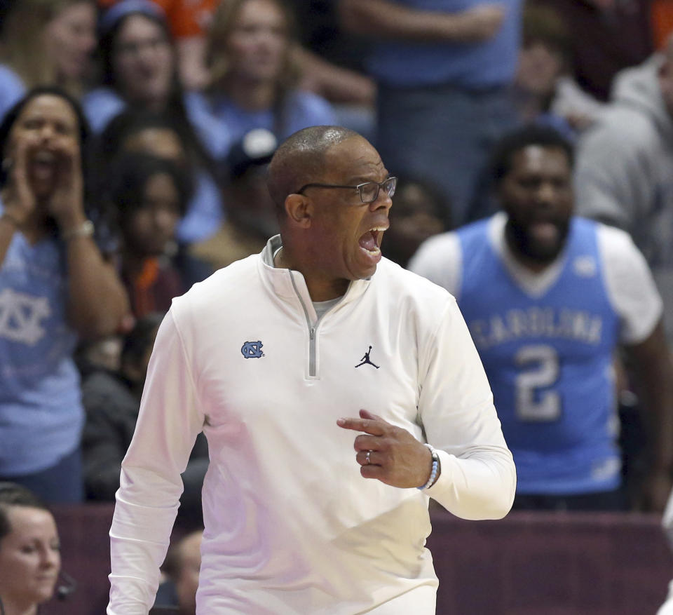 North Carolina head coach Hubert Davis reacts in the second half of an NCAA college basketball game against Virginia Tech in Blacksburg Va., Sunday Dec. 4, 2022. (Matt Gentry/The Roanoke Times via AP)