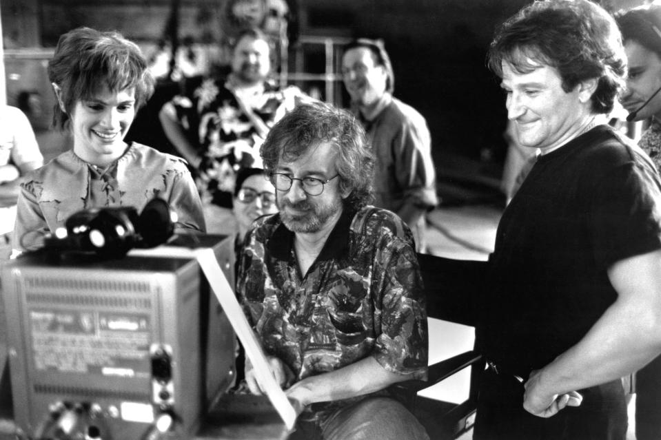 Steven Spielberg and Robin Williams laugh together behind the scenes of Hook