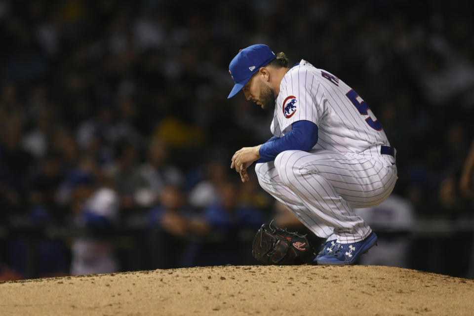 Chicago Cubs relief pitcher Nicholas Padilla pauses on the mound before pitching in his major league debut during the fourth inning of the second game of a baseball doubleheader against the St. Louis Cardinals Tuesday, Aug. 23, 2022, in Chicago. (AP Photo/Paul Beaty)