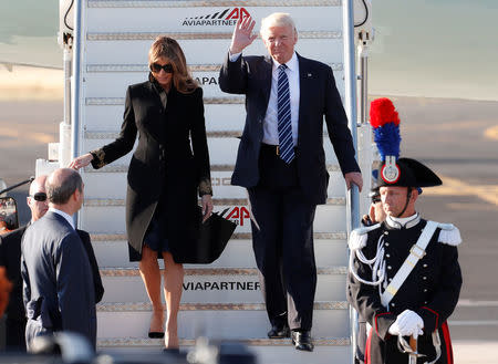 U.S. President Donald Trump and first lady Melania Trump arrive at the Leonardo da Vinci-Fiumicino Airport in Rome, Italy, May 23, 2017. REUTERS/Remo Casilli