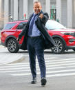 <p>Donnie Wahlberg arrives on the <em>Blue Bloods</em> set in great spirits in downtown N.Y.C. on Jan. 18. </p>